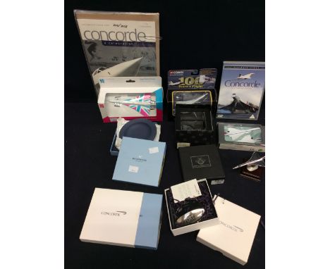 A collection of Concorde ephemera to include:- two Corgi boxed Concordes, London Olympic games boxed Concorde, a boxed Concor