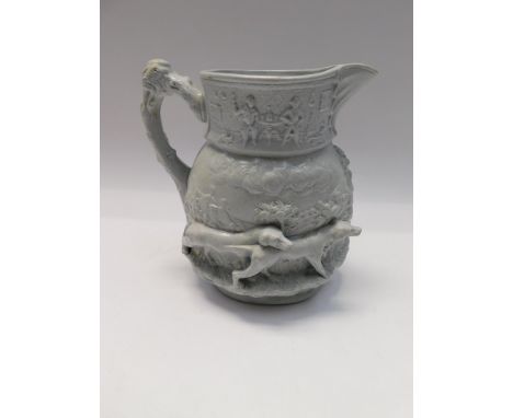 A 19th century Masons 'Toro' stoneware relief moulded jug, moulded with four dogs in a landscape, the C scroll handle moulded