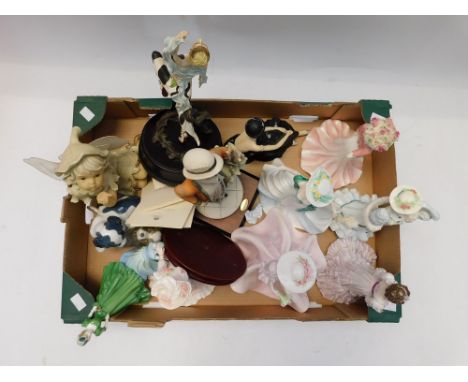 A collection of Coalport ladies and other resin ladies along with a Nao dog figure.&nbsp;Quantity , mostly good condition.