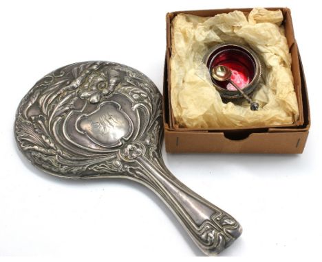 A Victorian silver salt cellar, of circular shape with ornate oblong scrolled designed side with ribbed edging, on three step