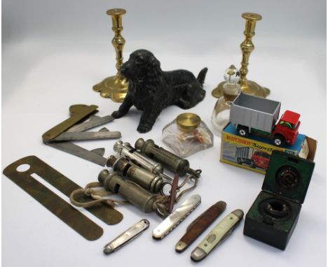 A mixed lot to include: a 19th century fleam marked Borwick Casteel; a novelty painted cast metal lighter in the form of a ho