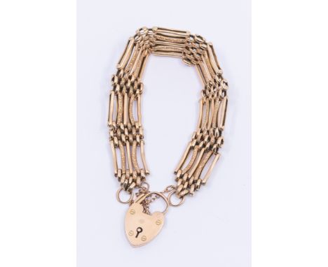 A 9ct gate bracelet, width approx 15mm, length approx 19.5cm, with padlock clasp and safety chain, weight approx 21gms  Furth