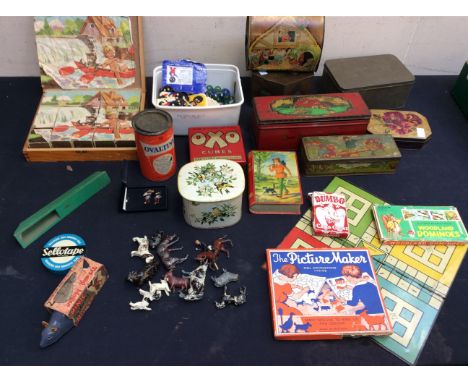 A collection of early 20th Century biscuit tins, mid 20th Century tins including Disney, marbles, vintage games/toys, Golden 