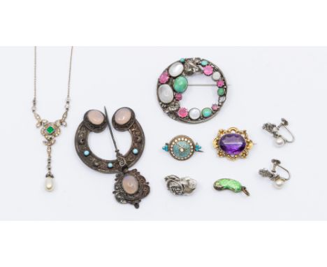 A small collection of jewellery to include; an Arts & Crafts gem set unmarked silver circular brooch, having hand made leaf a