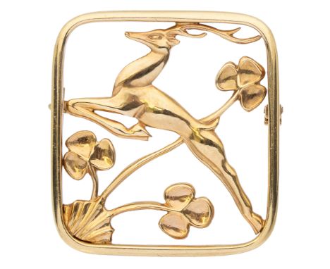 A Geoffrey G Bellamy brooch for George Tarratt, comprising a cushion shaped wire form inset with a leaping deer motif and flo