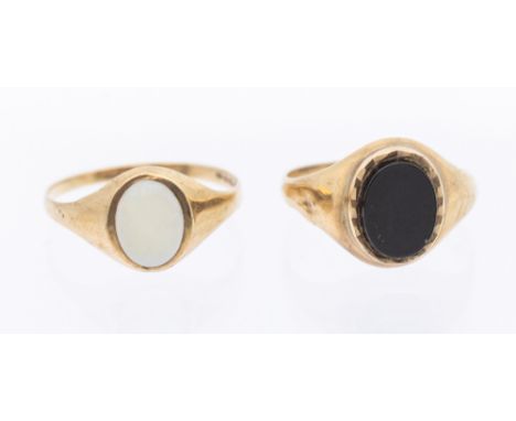 A 9ct gold onyx set signet ring, size M, along with a  9ct gold and opal ring, (stone abraded)  size O, combined total gross 