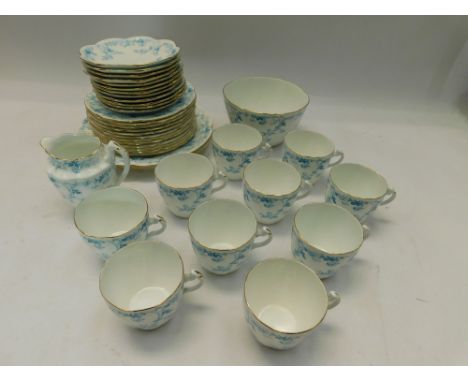 A 1920s Shelley tea service with no pot, late Foley pattern.&nbsp;Quantity , mostly good condition , some with wear