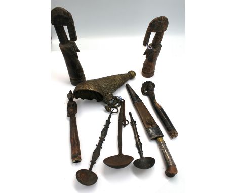 A 19th / 20th century possibly Nigerian / Benin bronze horn with leopard handle; four various African tourist sculptures, all