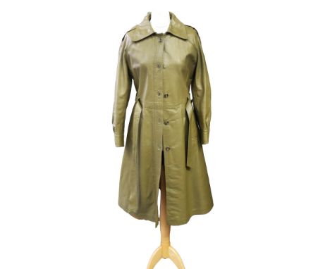 An olive green leather coat (hardly worn) with matching buttons at the back, epaulettes on shoulders, belt with large loop, s