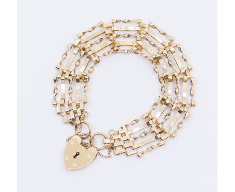 A 9ct gold ladies gate bracelet, width approx 15mm, padlock clasp, length approx 18.5cm, weight approx 10.8gms  Further detai