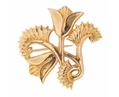 A 9ct tulip brooch design by by Geoffrey Bellamy for George Tarratt, comprising a tulip flower motif, length approx 28mm, sta