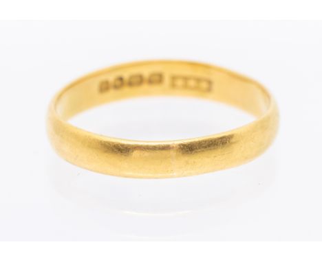 A 22ct gold band, width approx 3mm, size R, weight approx 3.9gms.  Further details: misshaped wear and tear commensuarte with
