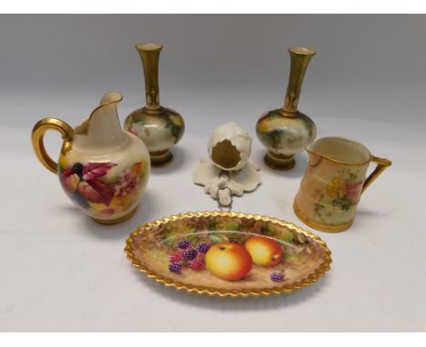 A collection of early 20th Century Royal Worcester pots to include a pair of vases, water/cream jugs, dish and a wall hanging