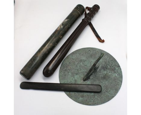 1950s/60s police truncheon, ebony page turner, MKI shell case and a reproduction sun dial.