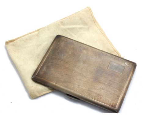 A George VI engine turned silver cigarette case, of rectangular shape with gilt interior, hallmarked by W.T. Toghill & Co, Bi