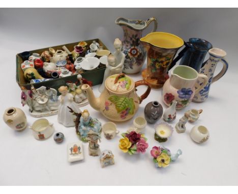 A collection of mixed ceramics to include; mid to late 20th century or modern Japanese or Chinese miniature vases, various de