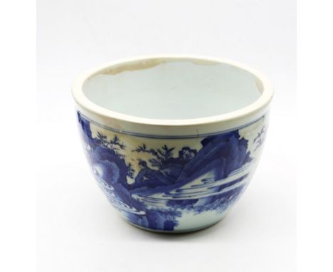 A Chinese blue and white porcelain planter, transitional period, possibly 17th century, painted with seven figures in a rocky