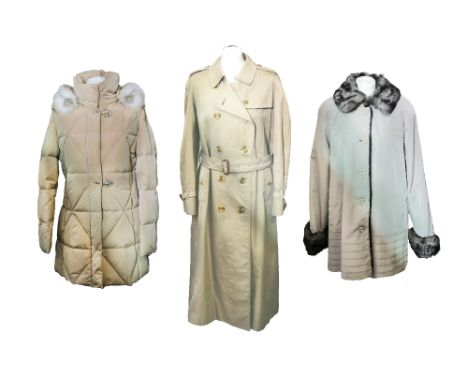 A traditional Burberry ladies raincoat; also a stone-coloured three-quarter length coat, fully lined in faux fur with faux fu