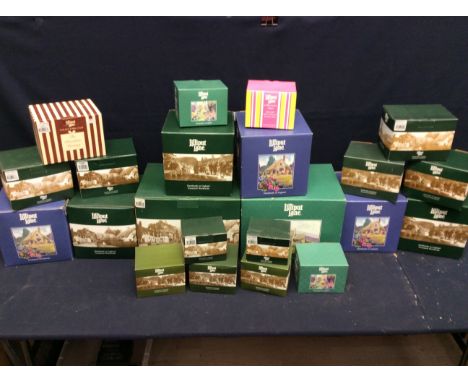 A collection of 22 Lilliput Lane models of various sizes and styles to include Collectors Club Chocolate Factory, Collectors 