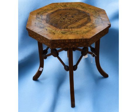 A Victorian rosewood low table with an hexagonal top inlaid with Tunbridge Ware and geometric frieze decoration, standing on 