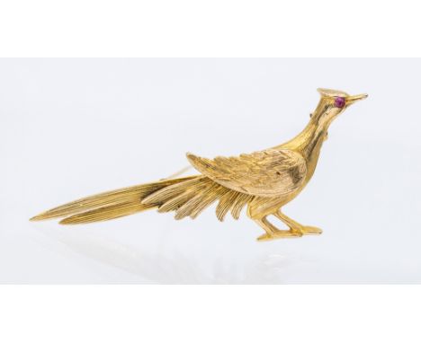 A ruby set 9ct gold brooch modelled as a bird, small ruby set eye, length approx 60mm, pin and roller clasp, brooch London 19