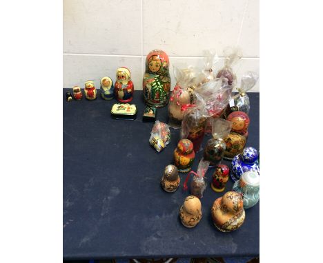 A collection of mid to late 20th Century Russian dolls and trinket boxes, some still in packets, (Q).