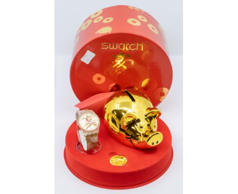 2007 boxed Swatch Chinese symbol, piggy bank gold medallion called Be Lucky.  Note: regarding watches/pocket watches please n