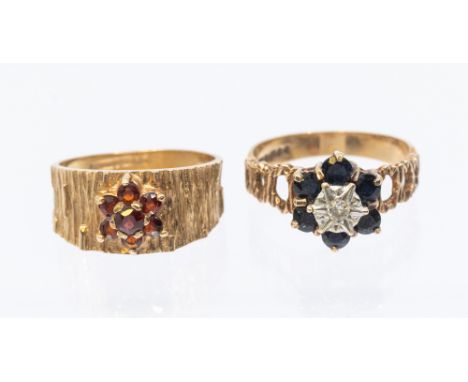 A vintage garnet and 9ct gold cluster ring, comprising a garnet floral cluster set to a bark finish band, size O, along with 