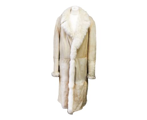 A Gucci suede over coat with shearling collar and lining, large belt with a looped brass clasp and leather loops, one decorat