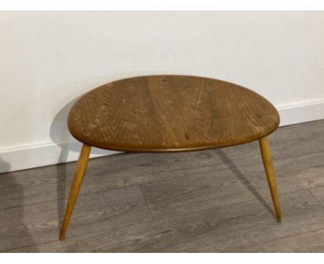 BLONDE ERCOL PEBBLE SHAPED SMALL TABLE 65CM BY 43CM BY 40CM