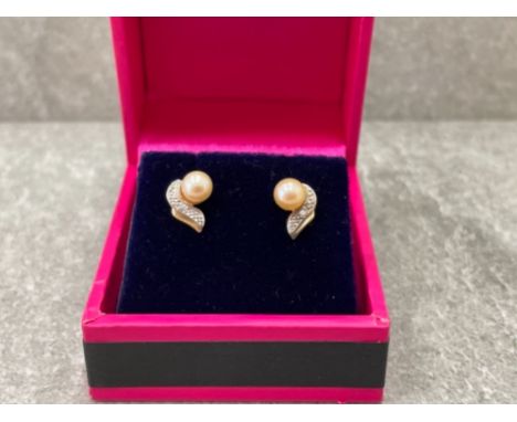 PAIR OF GOLD PEARL AND DIAMOND SET EARRINGS