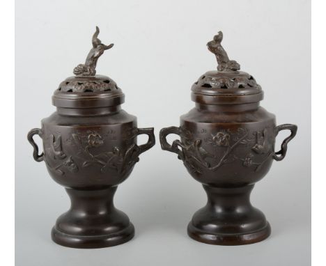 Pair of Japanese bronze Koro, pierced tops, the bodies with birds and flowers, 26cm.