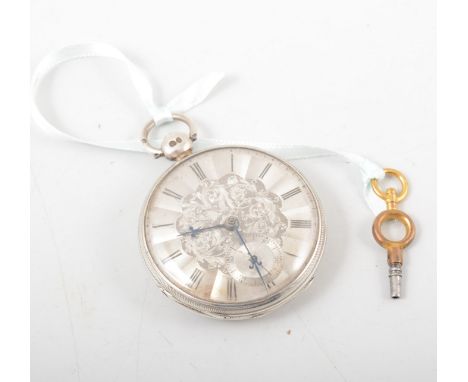 A small silver open face pocket watch, 38mm scroll engraved silver dial with roman numeral chapter ring and subsidiary second