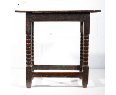 Joined oak table, rectangular cleated top, bobbin turned legs, joined by rails, width 76cm, depth 47cm, height 71cm.