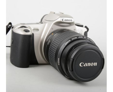 Canon EOS300 SLR camera with carry case, along with other cameras equipments and cables. 