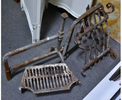 Pair of cast iron andirons hight 50cm, a wrought iron grate and another grate. 