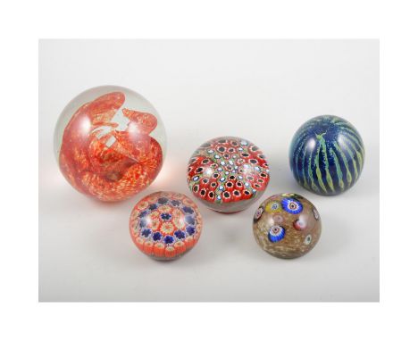 Mdina glass paperweights, seven other glass weights and a ceramic paperweight, (9). 