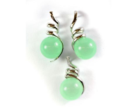 A pair of 925 silver drop earrings and matching pendant set with polished jade.