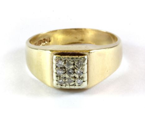 A gentleman's 9ct yellow gold diamond set signet ring, (K.5).