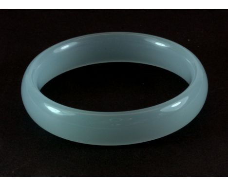 A carved lavender jade bangle, Dia. 6cm