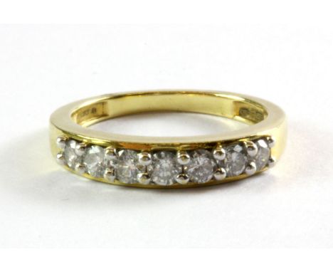 An 18ct yellow gold diamond set half eternity ring, approx. 0.5ct overall (K).