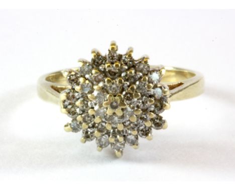 A 9ct yellow gold diamond set cluster ring, approx. 0.5ct overall, (K).