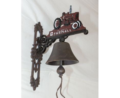 A cast farmer tractor bell