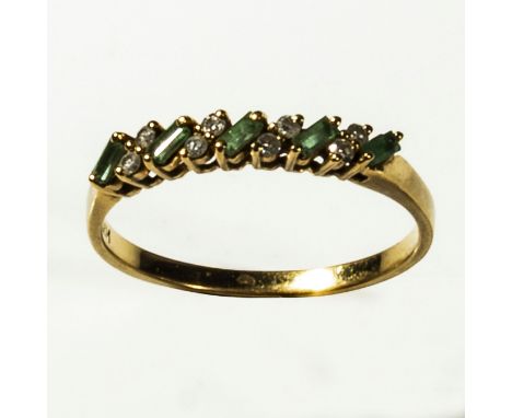 A 9ct gold baguette cut emerald and diamond ring, size U