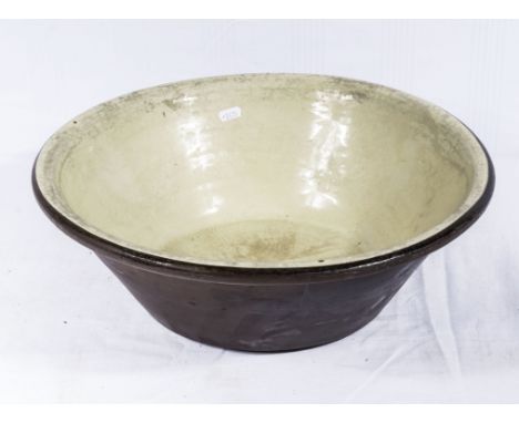  A vintage terracotta dairy cream bowl