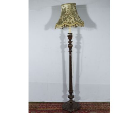 A Mahogany standard lamp