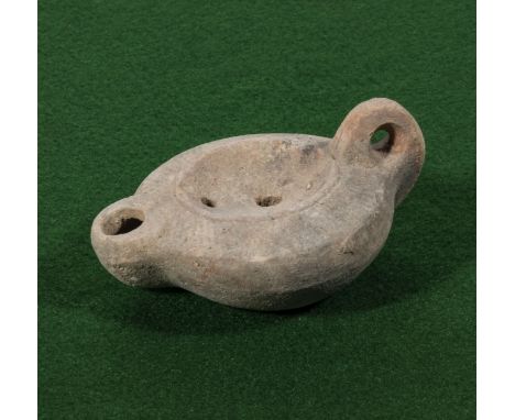 A small Roman oil lamp