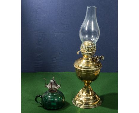 A brass oil lamp and a glass oil lamp