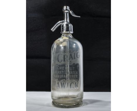 A Vintage soda syphon glass body etched with J Craig Chemist, Aerated water manufacturer Hawick