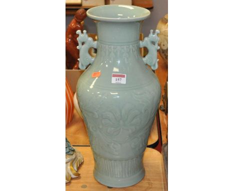 A modern Chinese style celadon glazed vase, of baluster form, relief decorated with flowers, h.43cmCondition report: Conditio